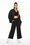 Female model in color block wide leg pants