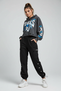 Female model in embroidered cargo pants