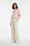Female model in loose long-sleeved top