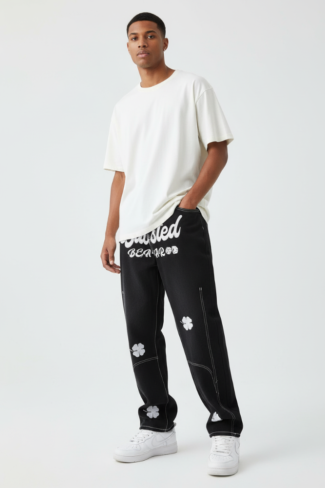 Unisex Vintage Clover Embroidered Denim Pants - Male Model